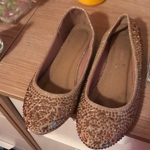 Gold flat shoes